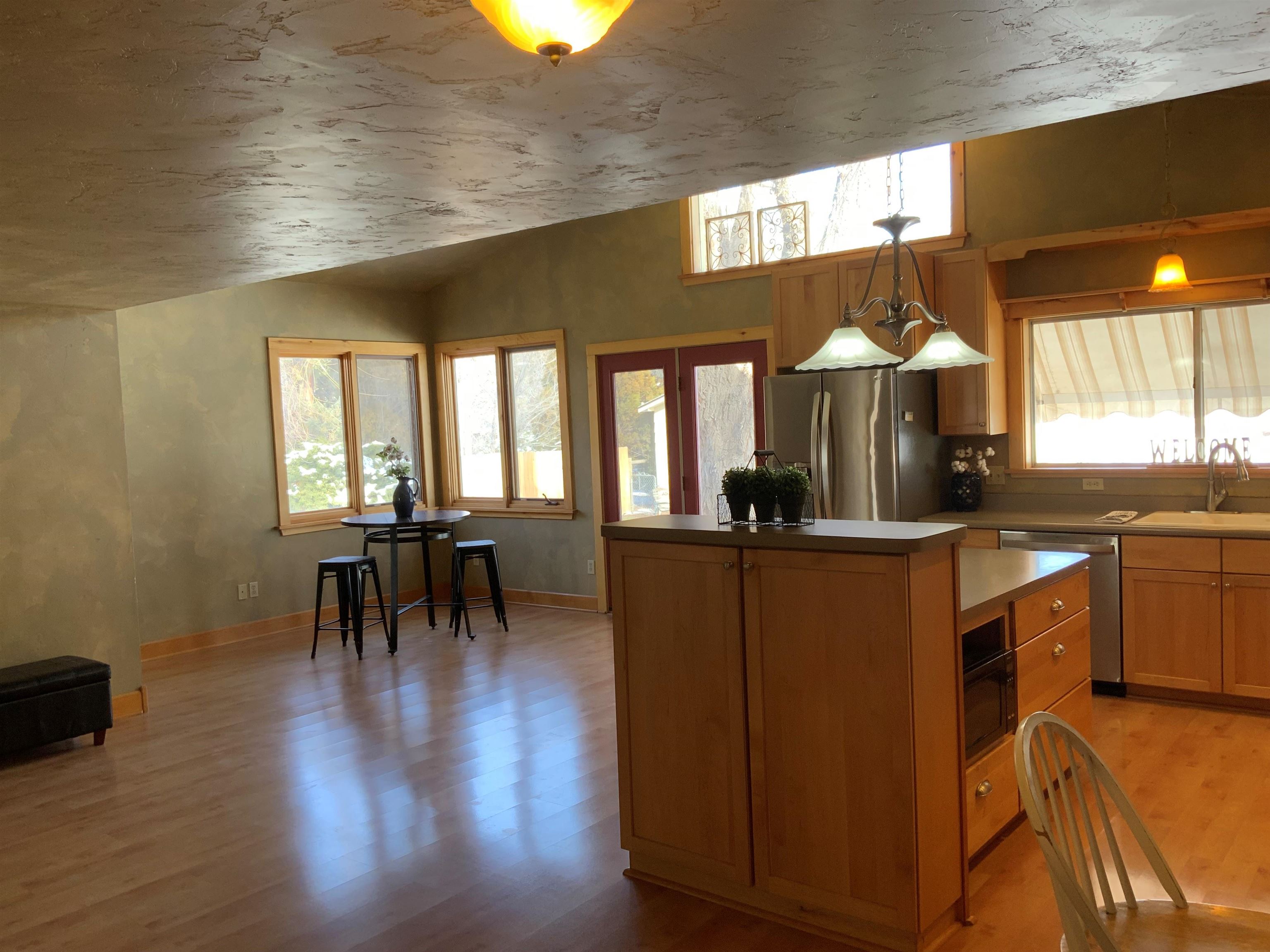 734-36 36 3/10 Road Palisade, CO 81526 - Photo 10 of 39 a kitchen with lots of counter top space and wooden floor