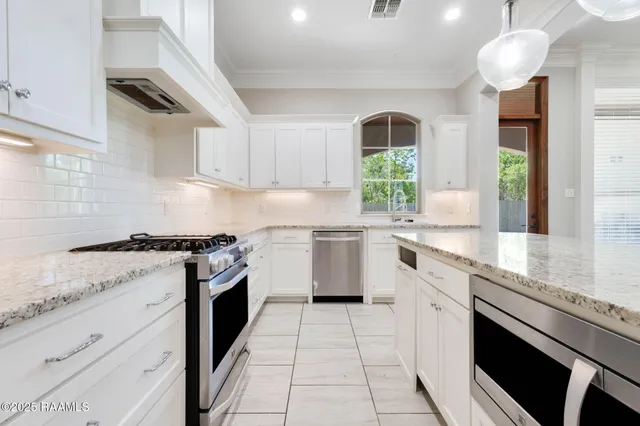 $573,500 | 501 Bronze Palm Way, Youngsville, LA 70592