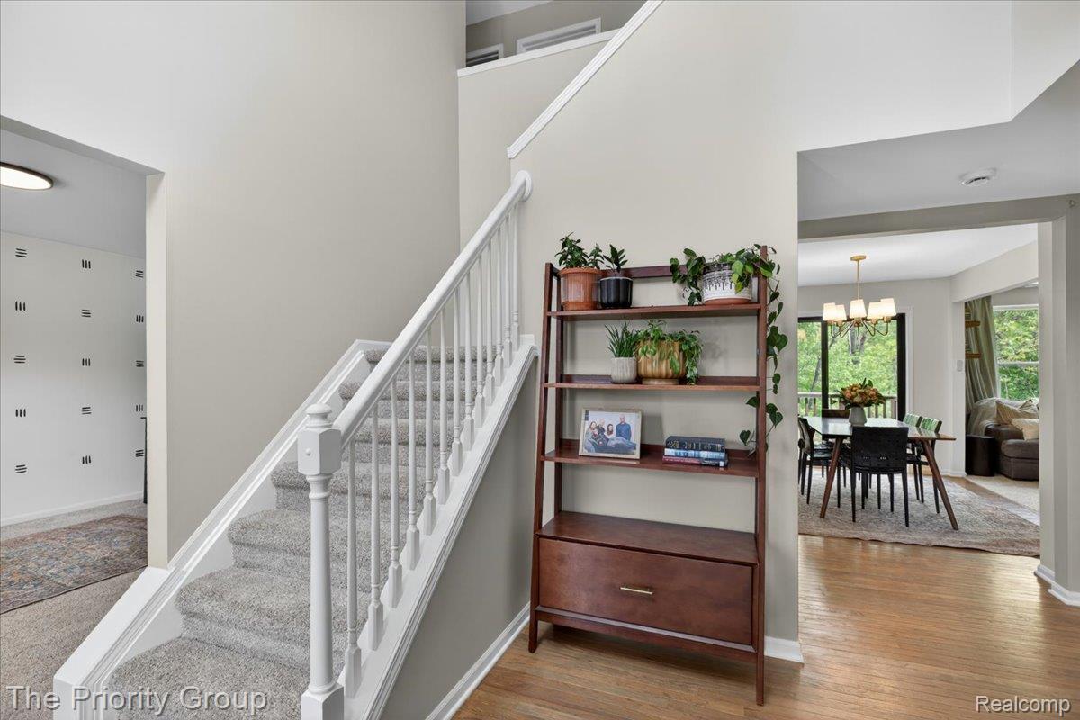 517 Deer Valley Road Holly, MI 48442 - Photo 5 of 61 Bright foyer with wood floors and open staircase.