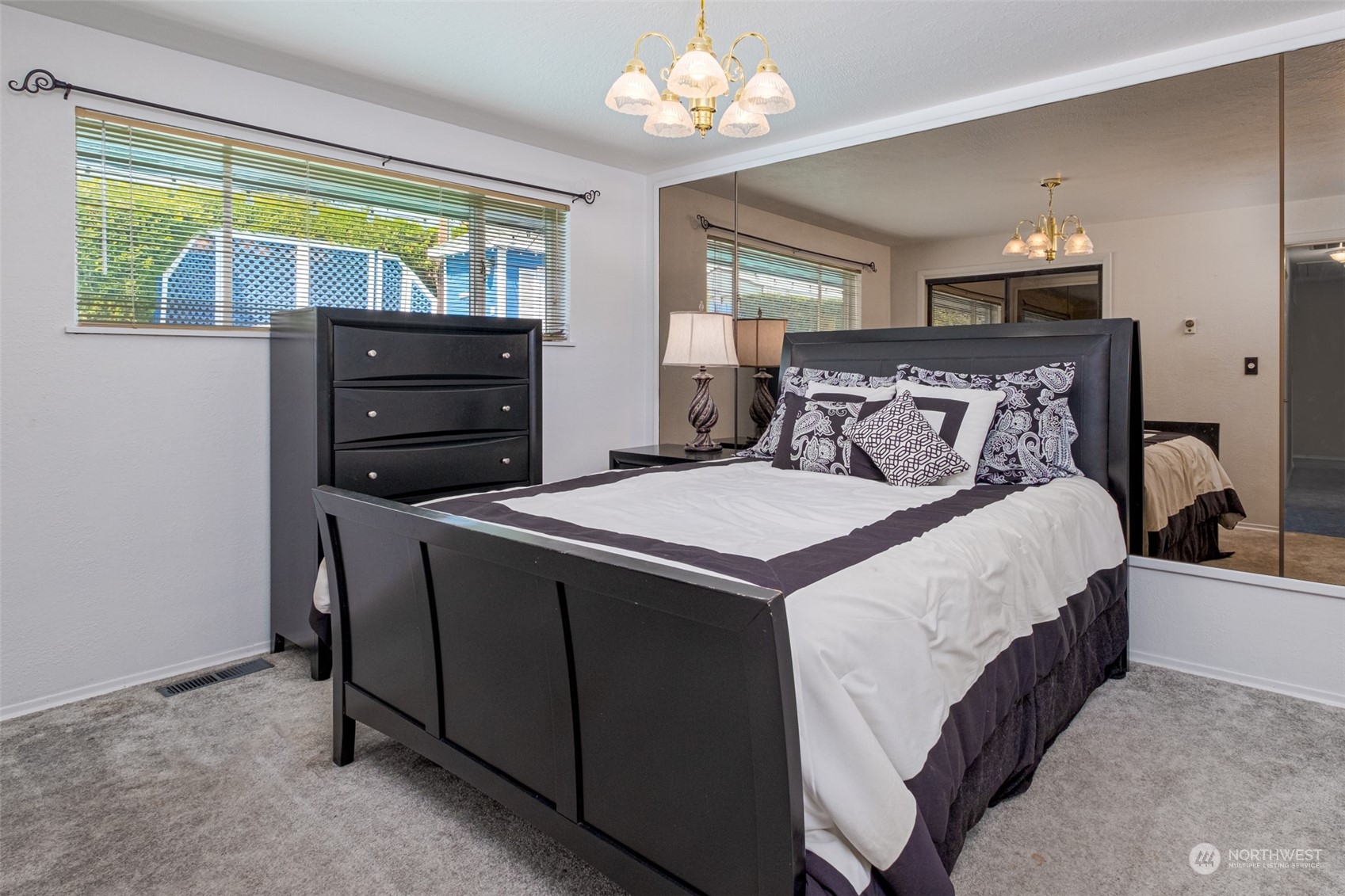 451 Statter Road Ephrata, WA 98823 - Photo 12 of 23 a bed sitting in a bedroom next to a window