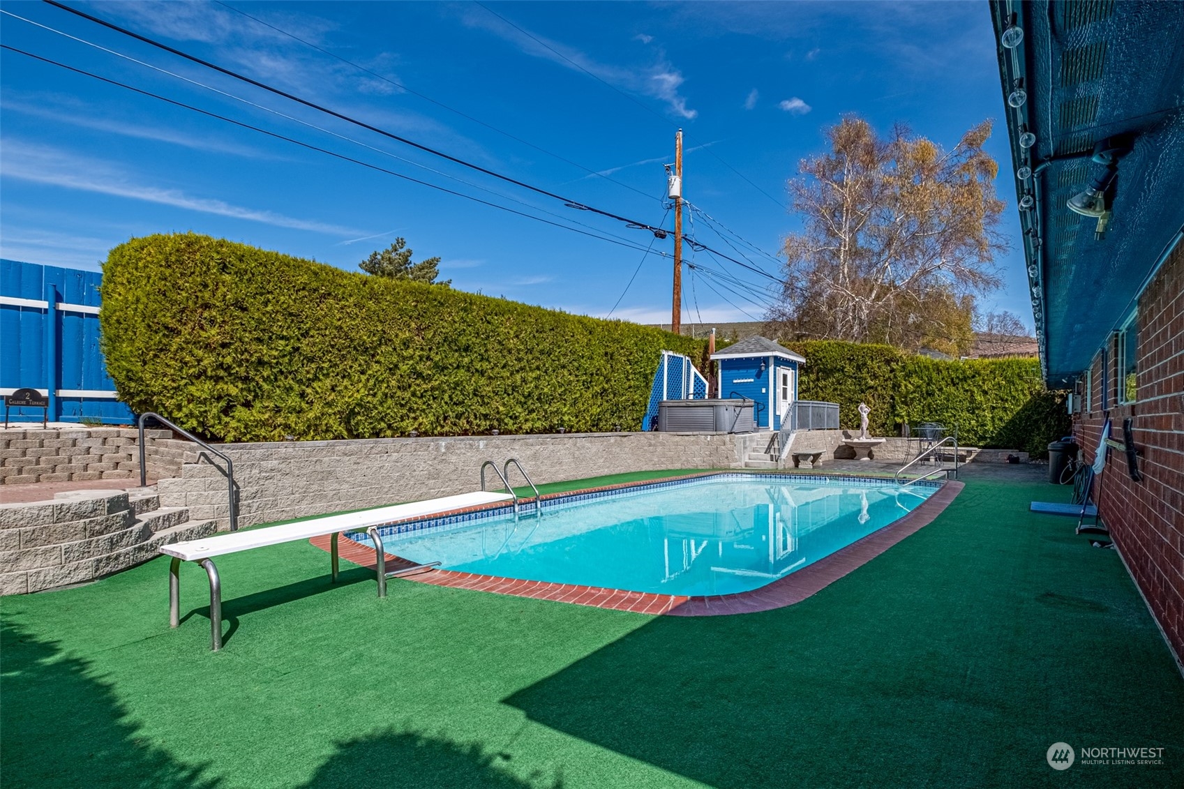 451 Statter Road Ephrata, WA 98823 - Photo 19 of 23 a view of a backyard with swimming pool