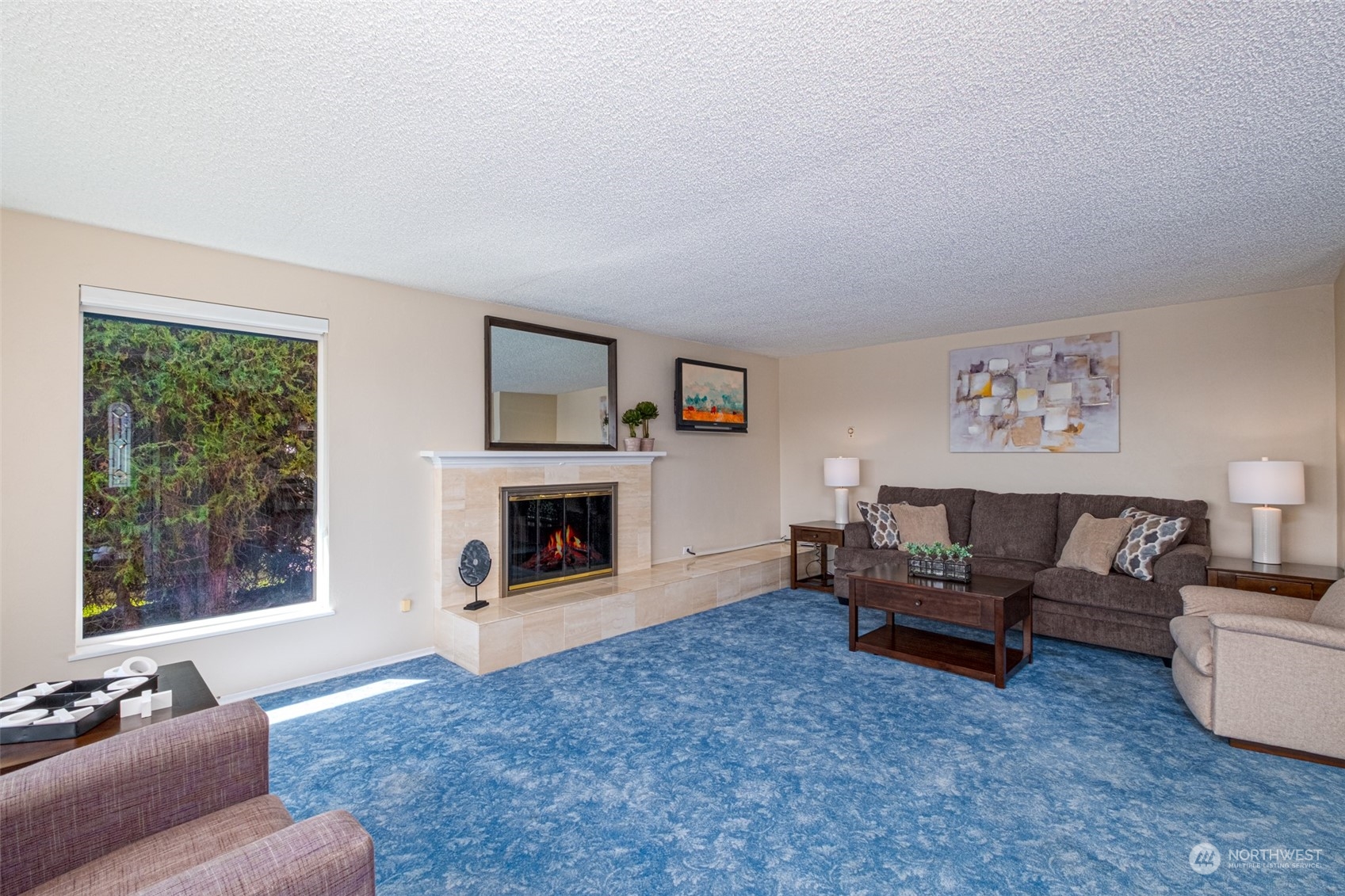 451 Statter Road Ephrata, WA 98823 - Photo 4 of 23 a living room with furniture and a fireplace
