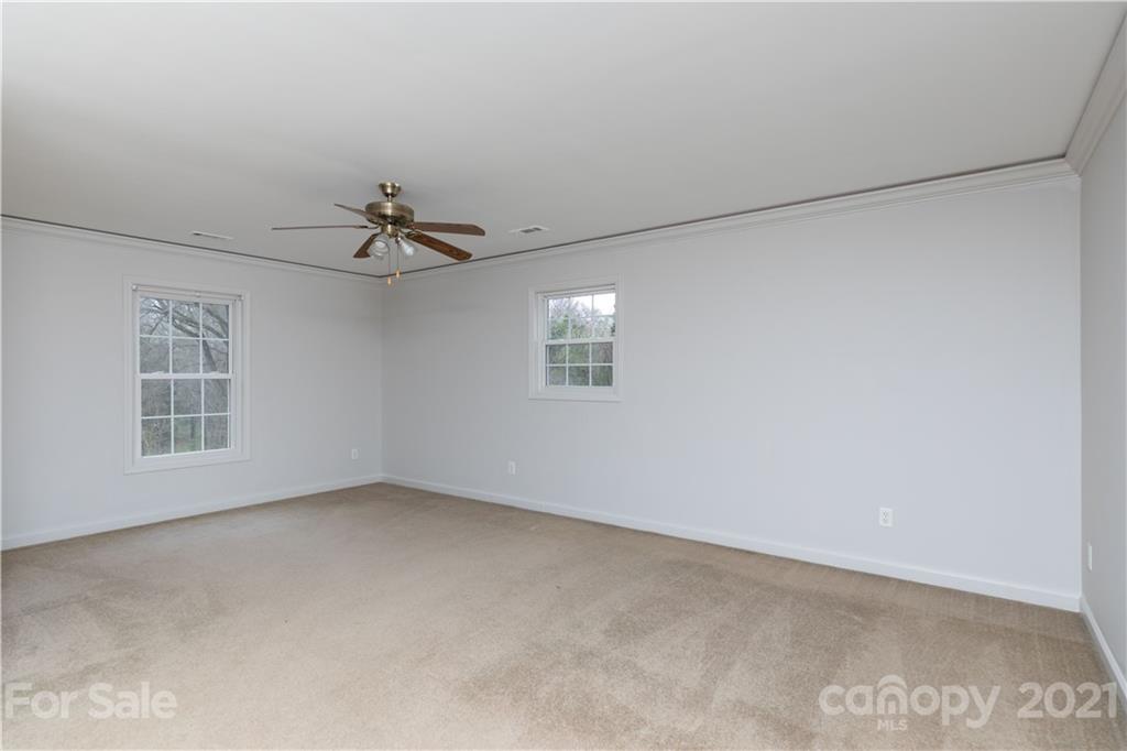 2381 Holbrook Road Fort Mill, SC 29715 - Photo 14 of 27 a view of an empty room with a window