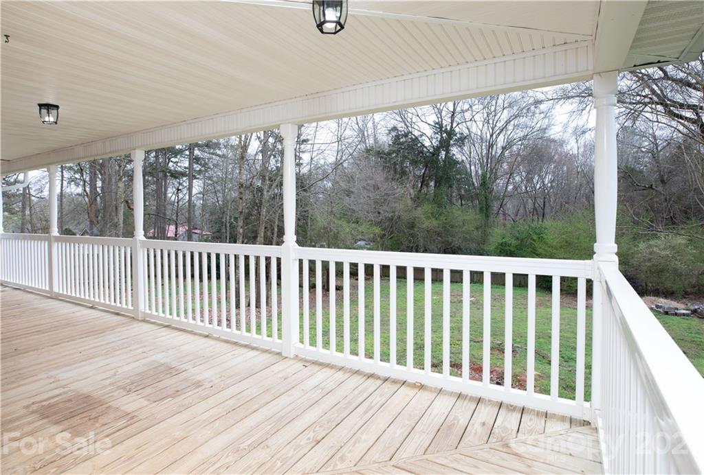 2381 Holbrook Road Fort Mill, SC 29715 - Photo 22 of 27 a view of a wooden balcony