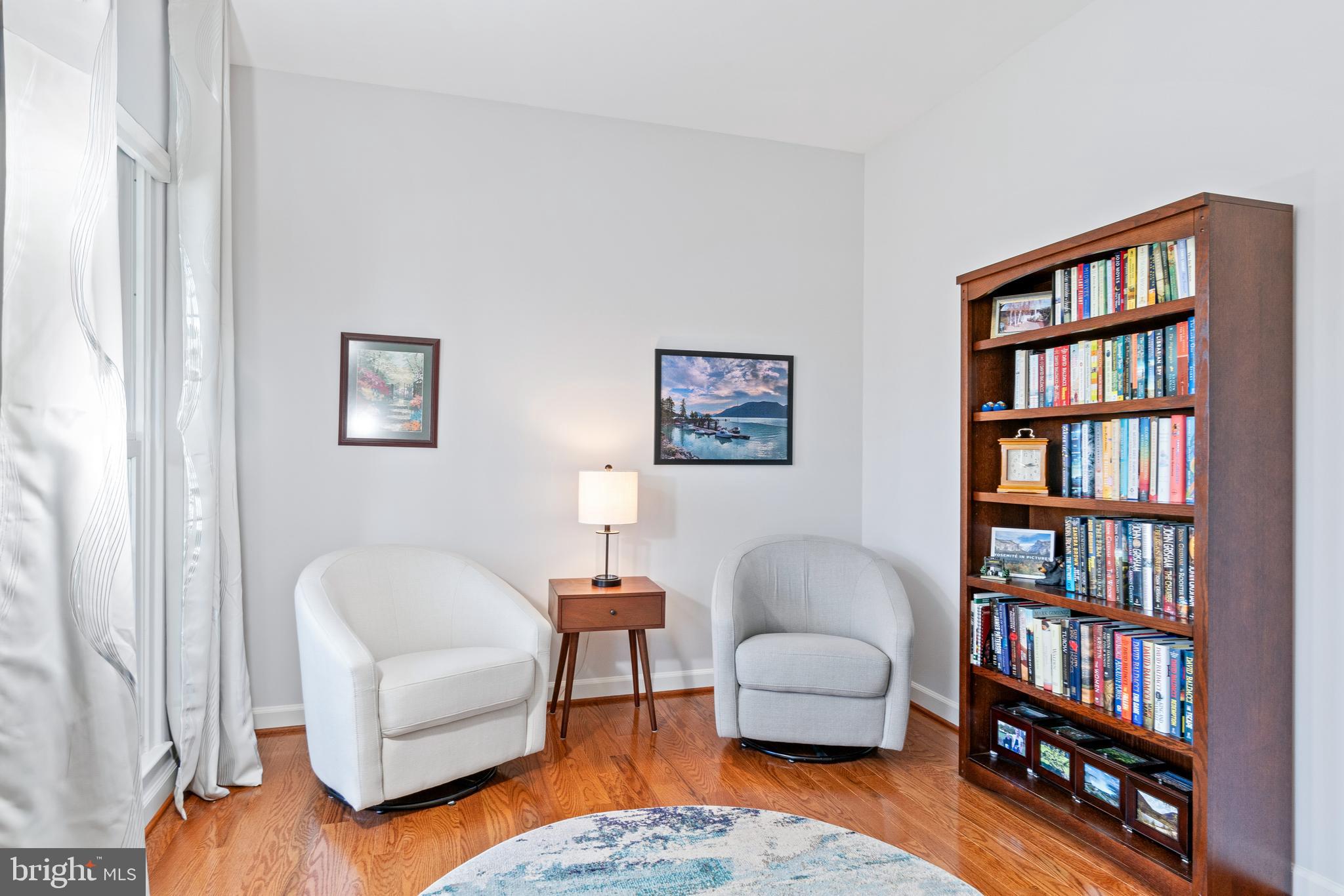 2803 Shadowridge Drive Olney, MD 20832 - Photo 18 of 55 a living room with furniture and a book shelf