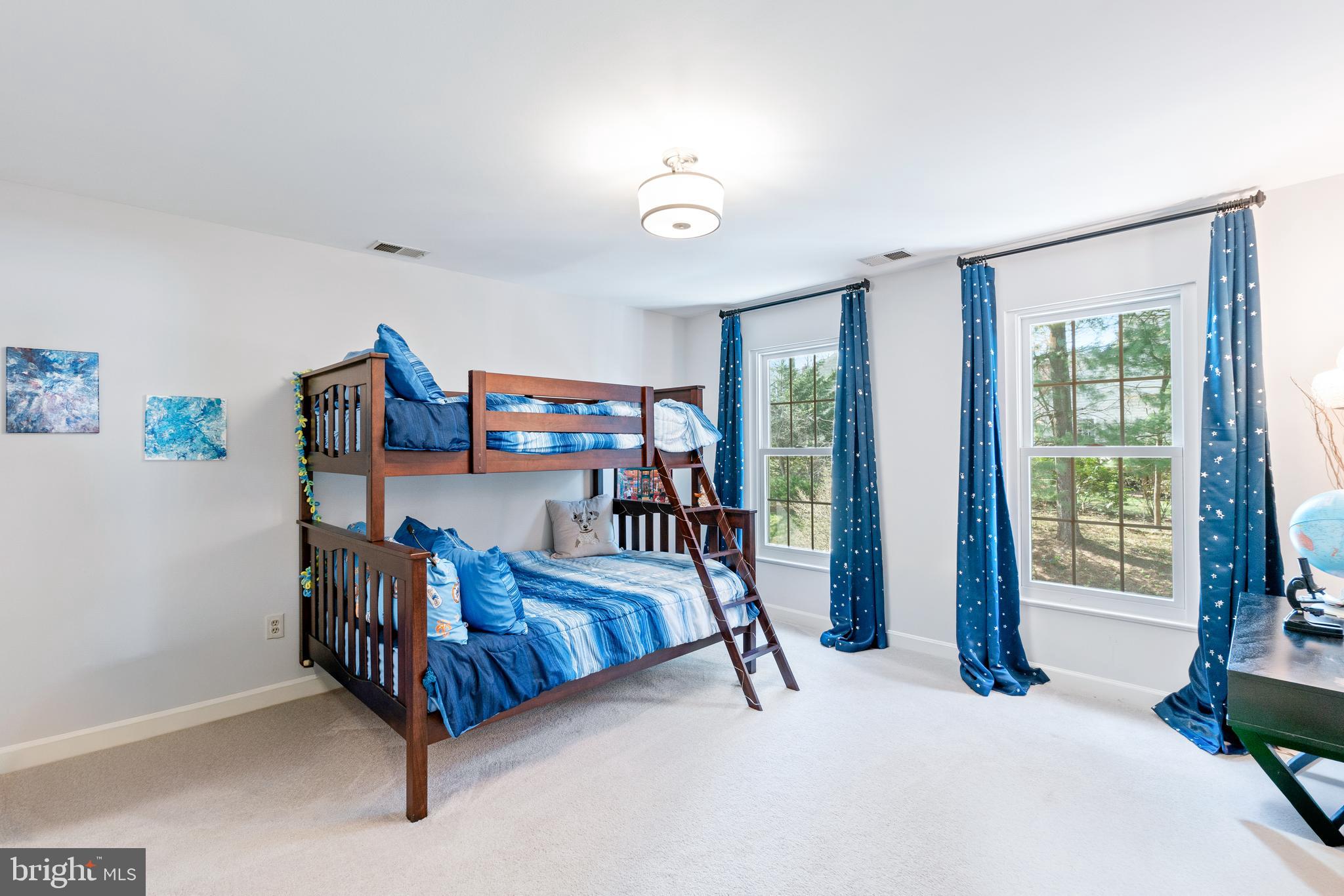 2803 Shadowridge Drive Olney, MD 20832 - Photo 23 of 55 a bedroom with furniture and a window