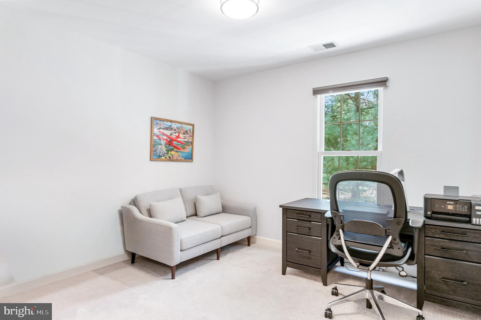 2803 Shadowridge Drive Olney, MD 20832 - Photo 26 of 55 a living room with furniture and a window