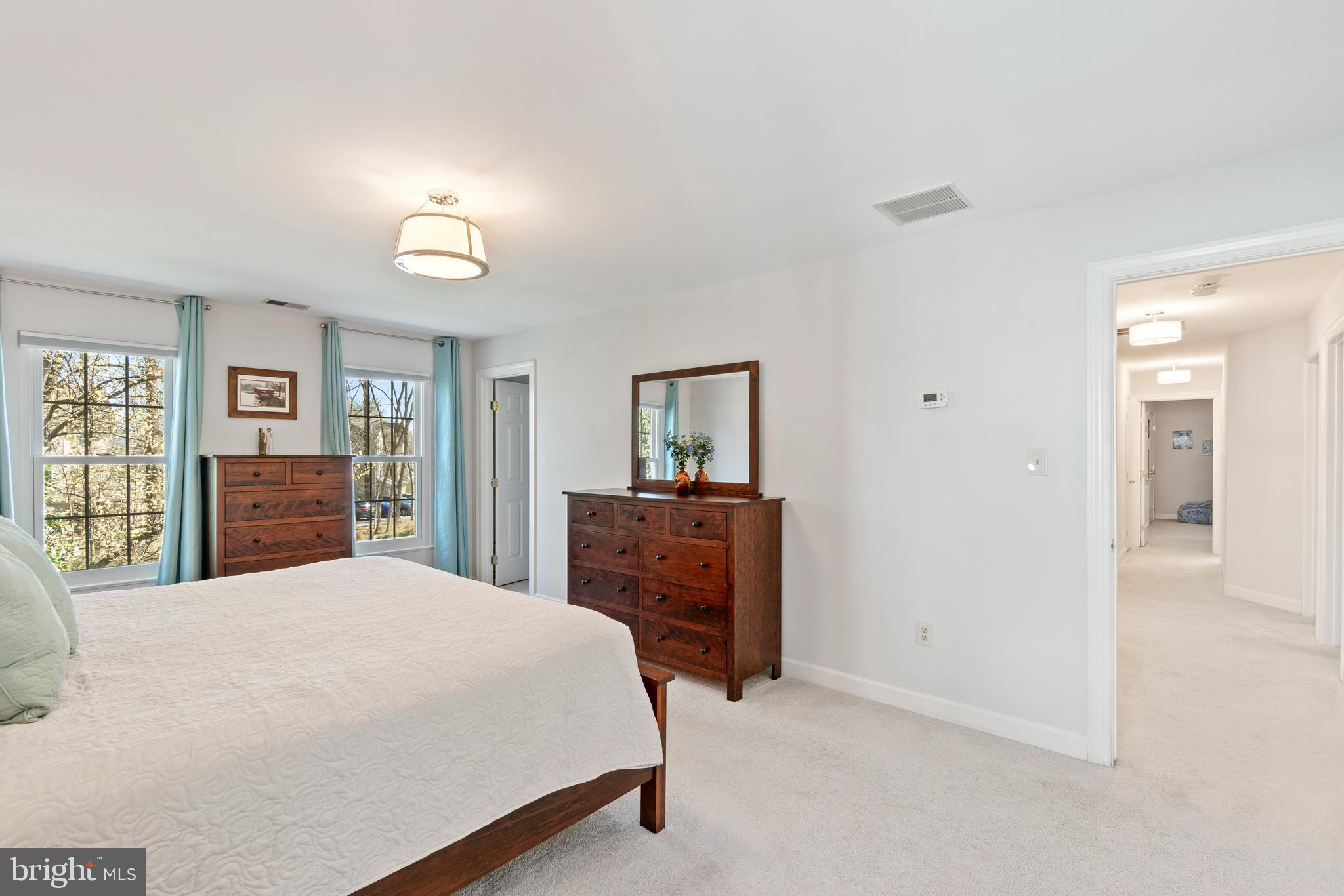 2803 Shadowridge Drive Olney, MD 20832 - Photo 34 of 55 a bedroom with a bed and a dresser