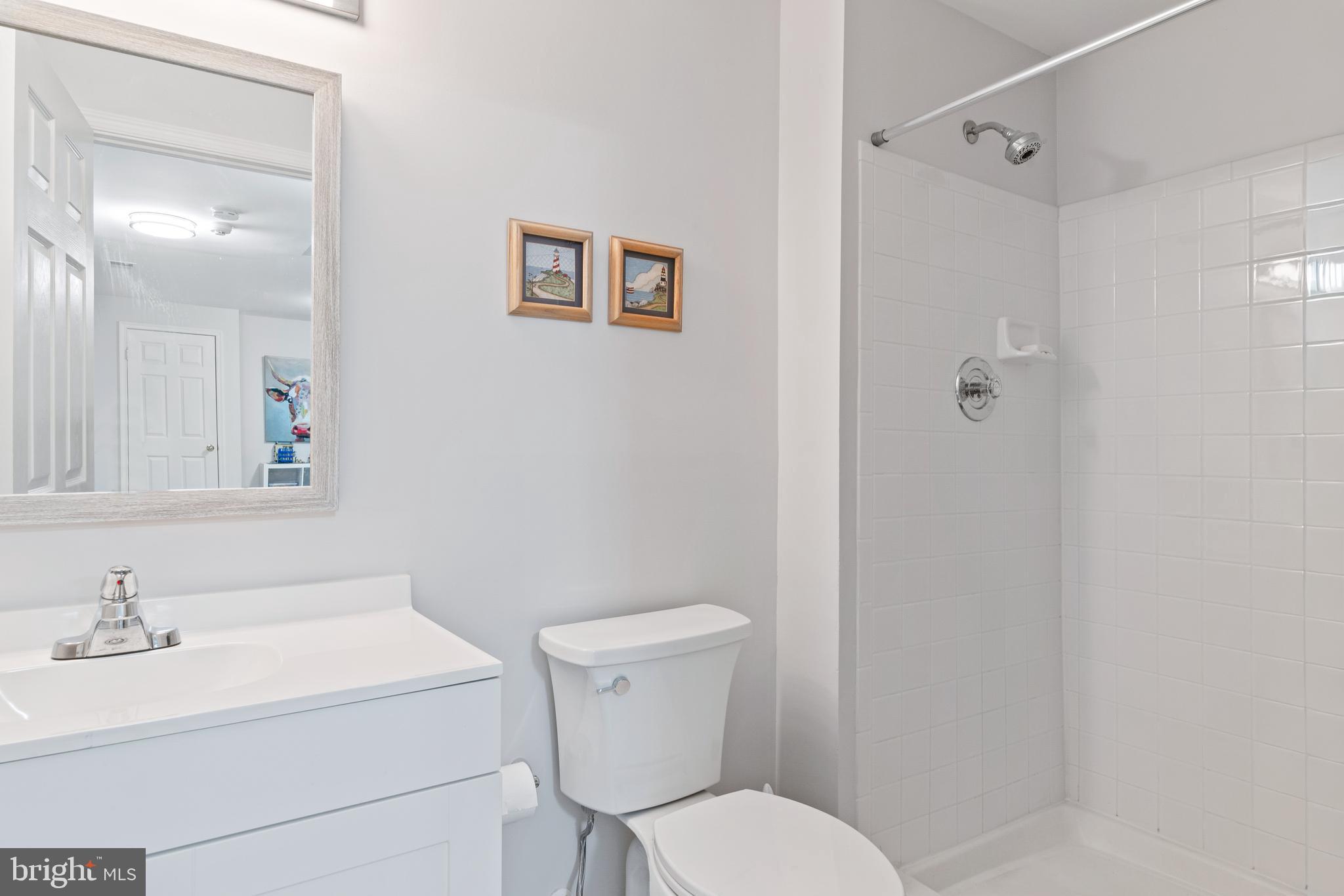 2803 Shadowridge Drive Olney, MD 20832 - Photo 41 of 55 a bathroom with a sink a toilet and shower