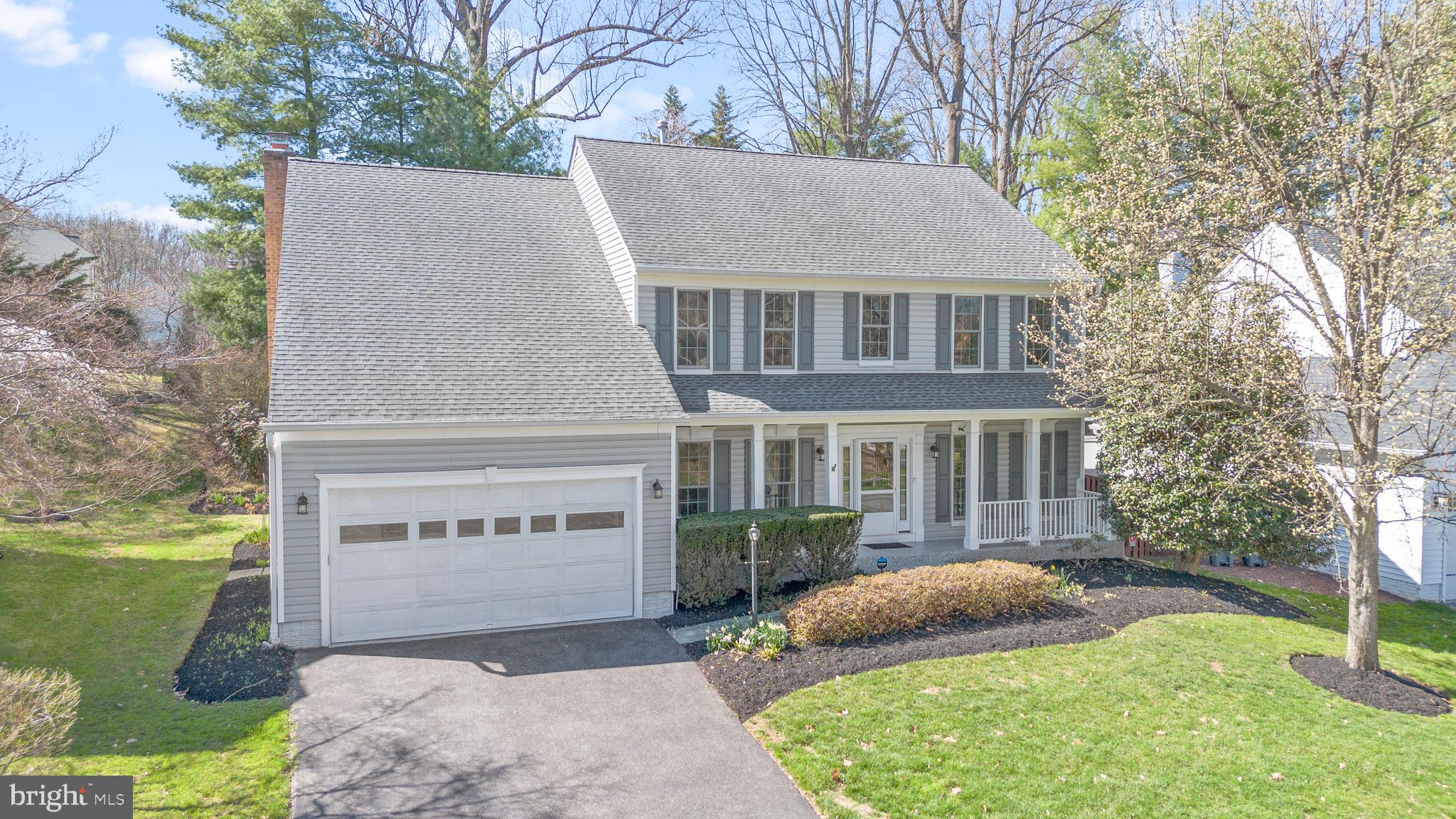 2803 Shadowridge Drive Olney, MD 20832 - Photo 55 of 55 a view of a house with a yard potted plants and a large tree