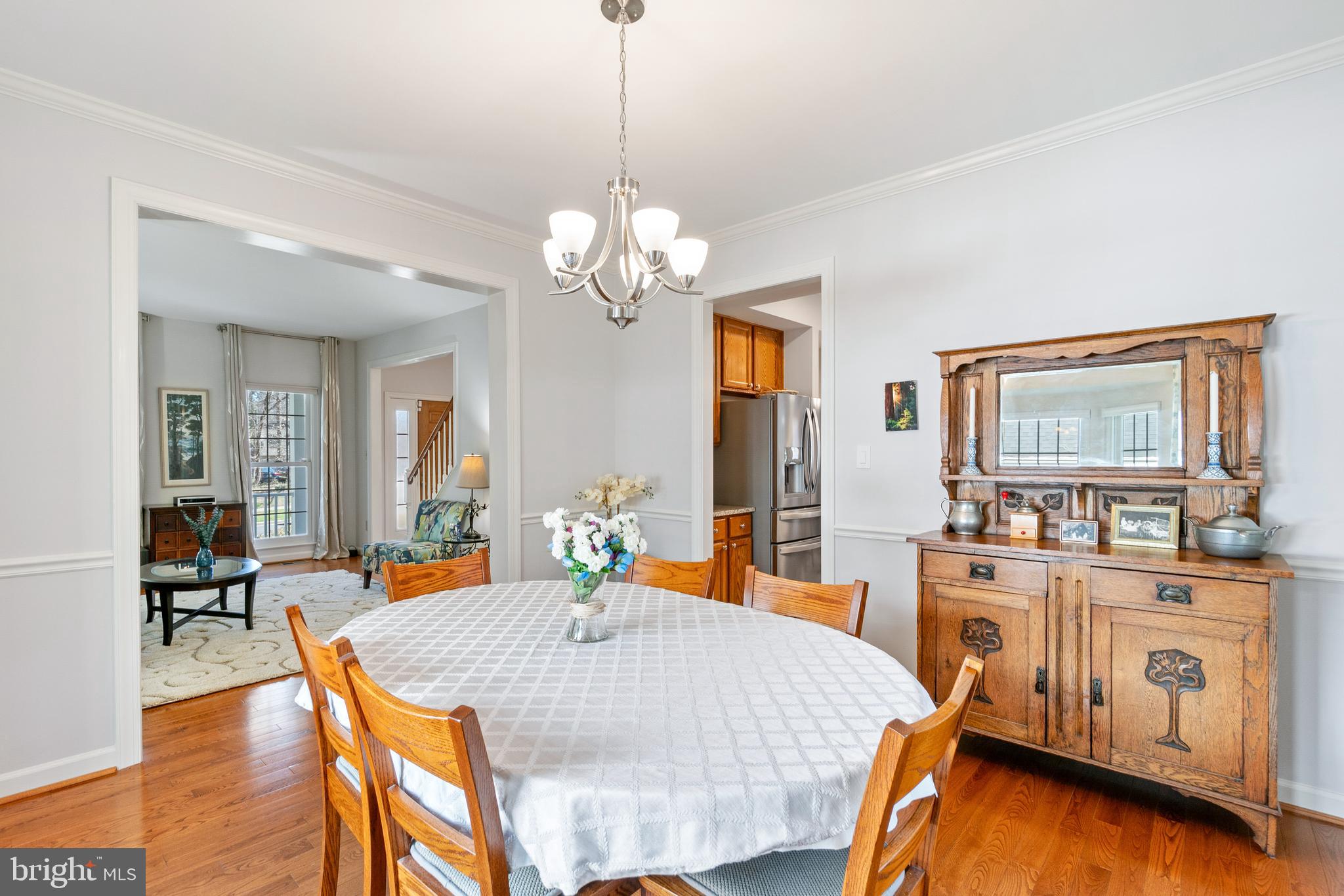 2803 Shadowridge Drive Olney, MD 20832 - Photo 6 of 55 a view of a dining room with furniture and wooden floor