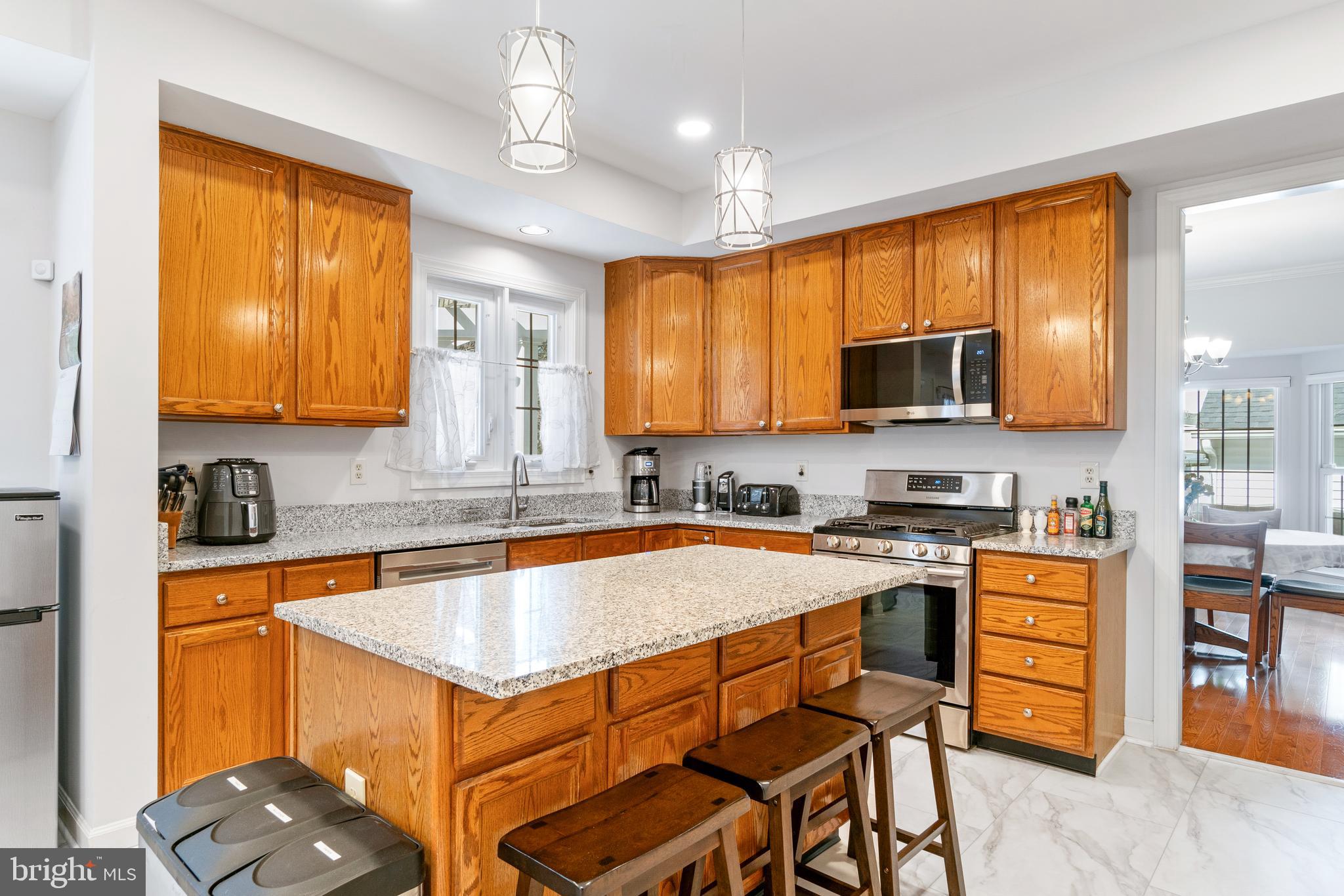2803 Shadowridge Drive Olney, MD 20832 - Photo 8 of 55 a kitchen with a sink appliances and cabinets
