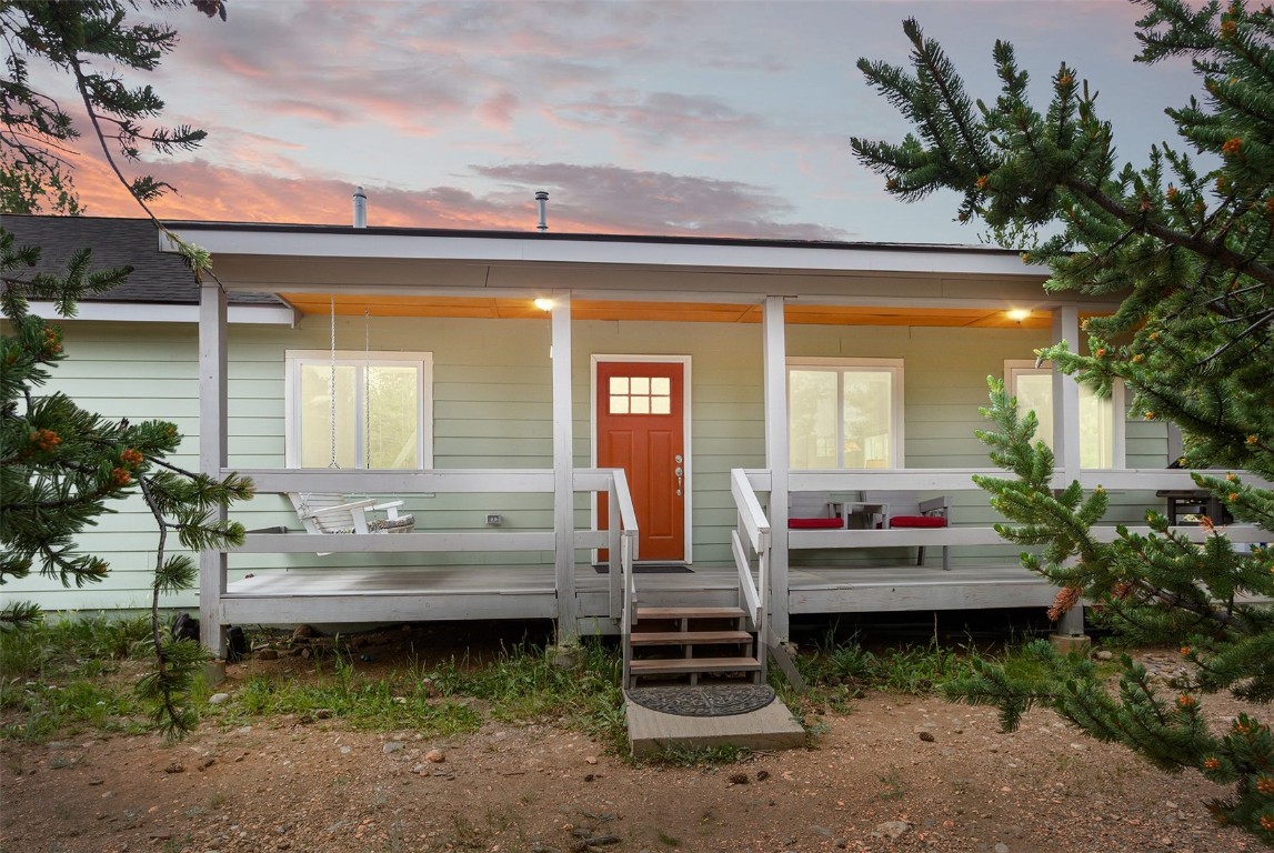 485 High Creek Road Fairplay, CO 80440 - Photo 2 of 32 a backyard of a house with yard and outdoor seating