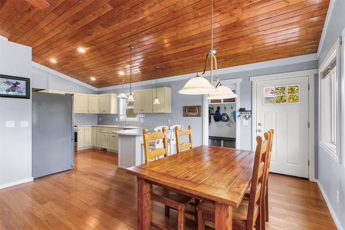 485 High Creek Road Fairplay, CO 80440 - Photo 8 of 32 a kitchen with a table and chairs in it