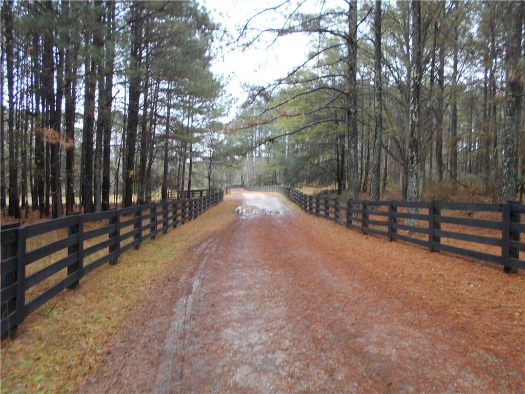 14-ac Youth Jersey Road Covington, GA 30014 - Photo 7 of 42 a view of pathway with a yard