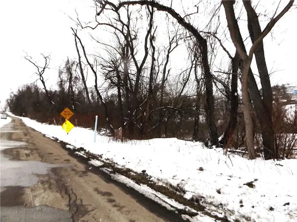 a view of snow on the road