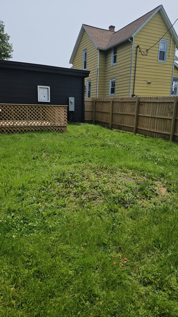 309 North Market Street Hoopeston, IL 60942 - Photo 22 of 45 a front view of a house with a yard