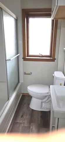 a view of a window with a small yard