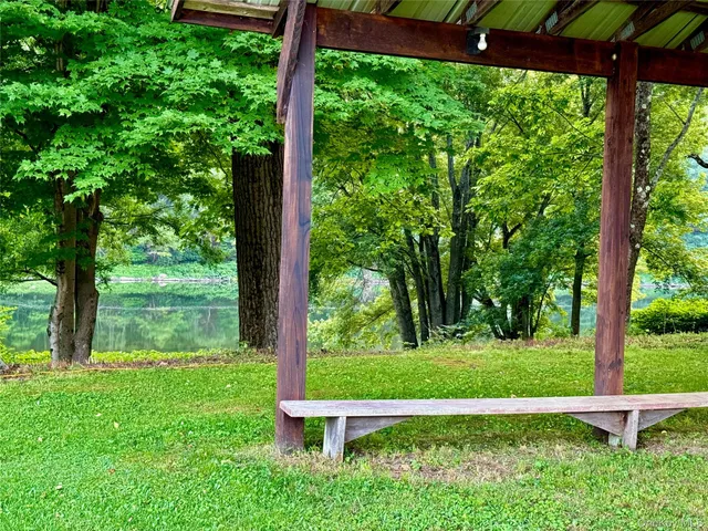 a view of a bench in a garden