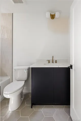 a bathroom with a sink and a toilet