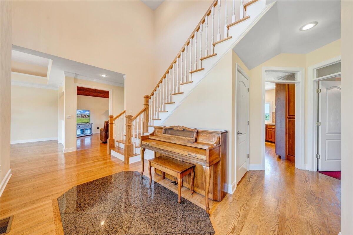 625 Frontier Way Fincastle, VA 24090 - Photo 7 of 105 a view of entryway and hall with wooden floor