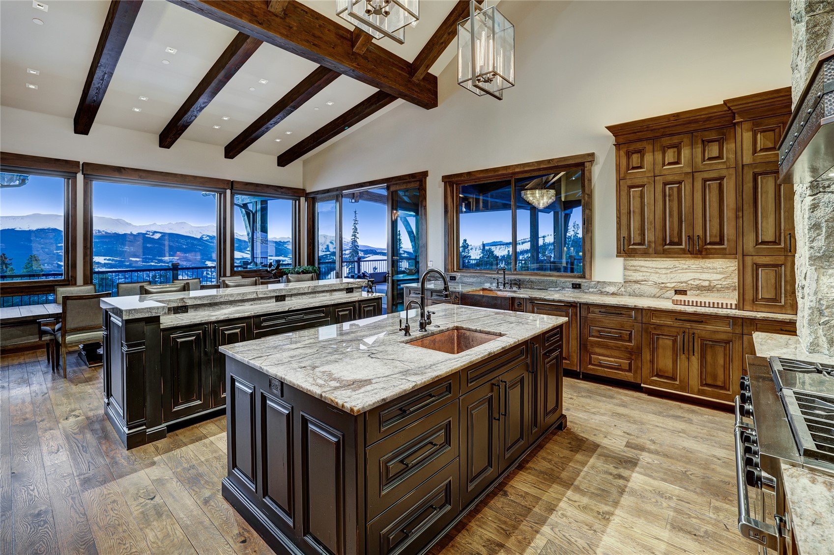 250 Sallie Barber Road Breckenridge, CO 80424 - Photo 18 of 50 a kitchen with a stove sink and cabinets