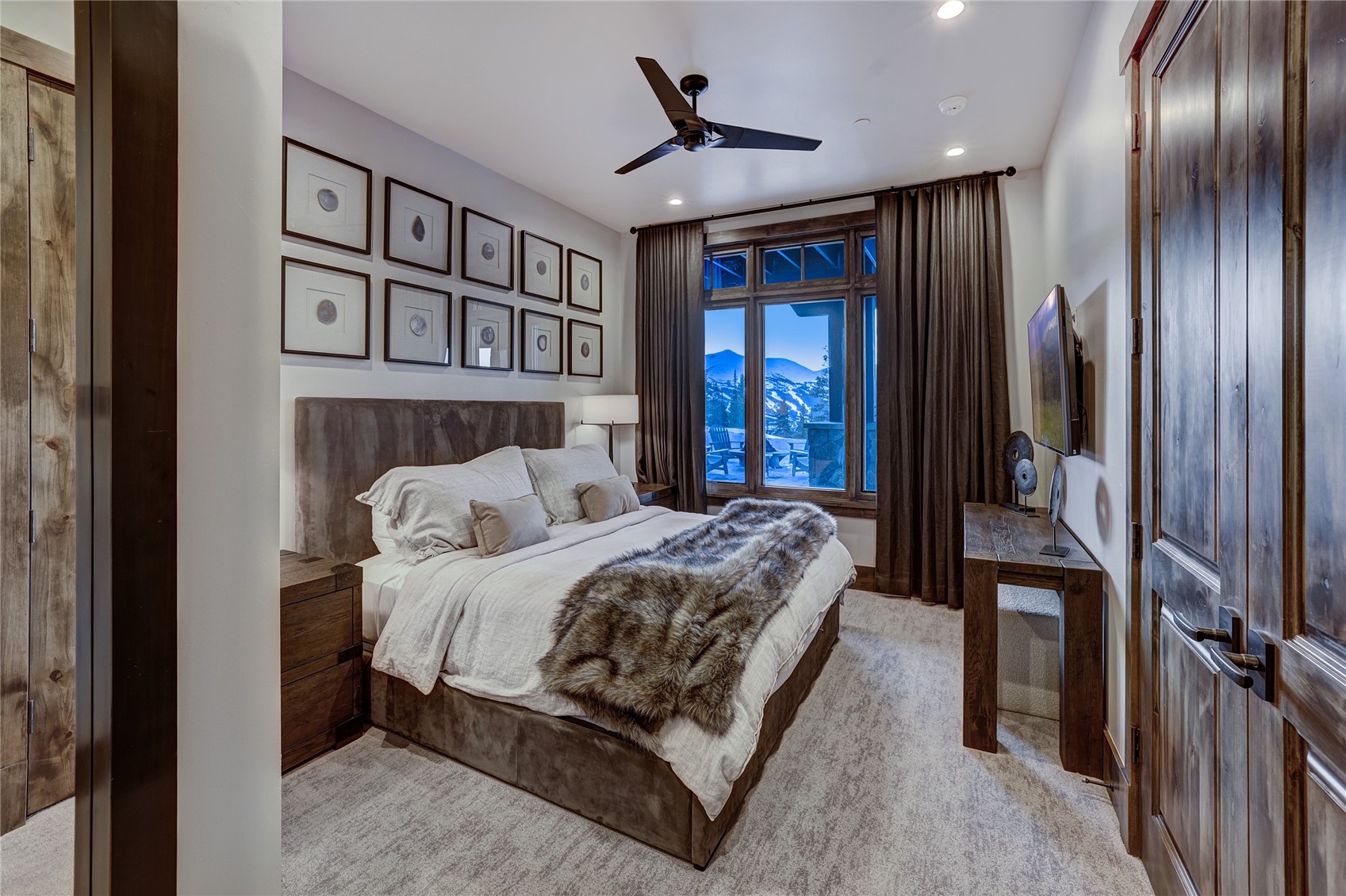 250 Sallie Barber Road Breckenridge, CO 80424 - Photo 37 of 50 a bed sitting in a spacious bedroom next to a window