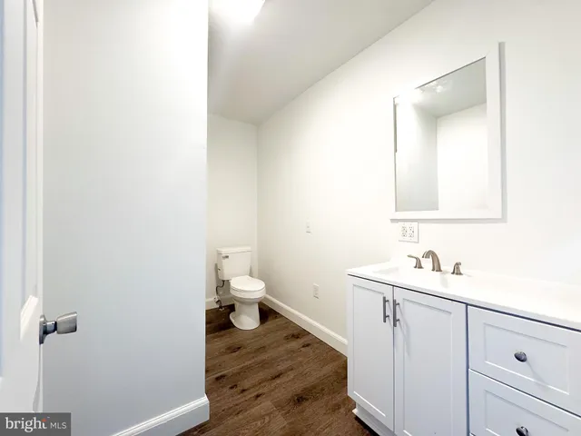 a bathroom with a sink and a toilet