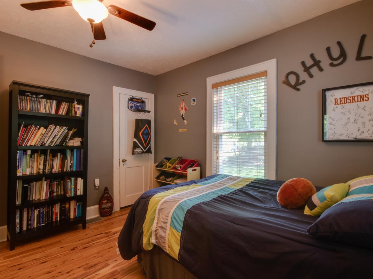 2585 Spaders Church Road Harrisonburg, VA 22801 - Photo 27 of 35 a bedroom with a large bed and a book shelf
