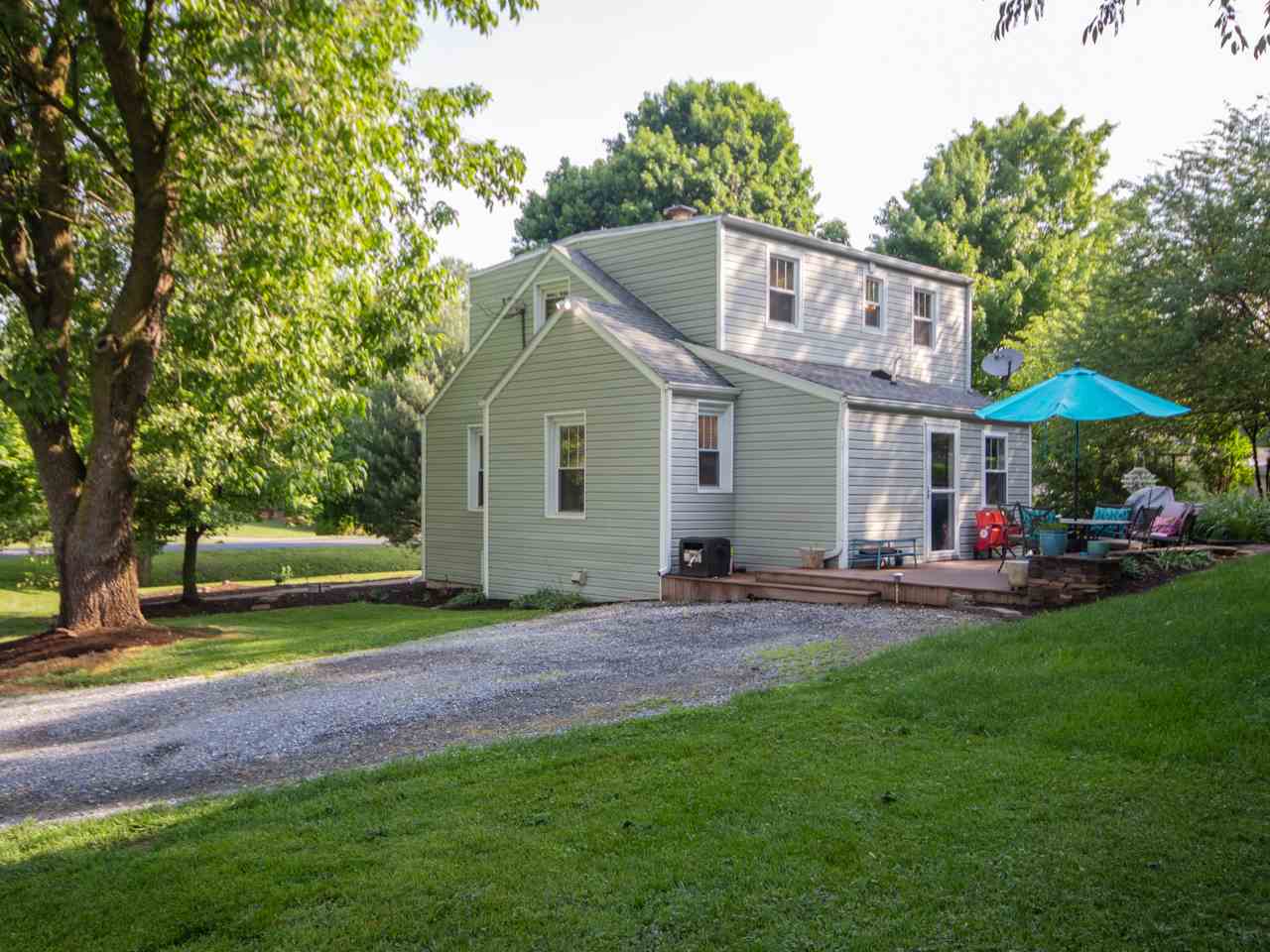 2585 Spaders Church Road Harrisonburg, VA 22801 - Photo 7 of 35 a front view of a house with a yard and trees