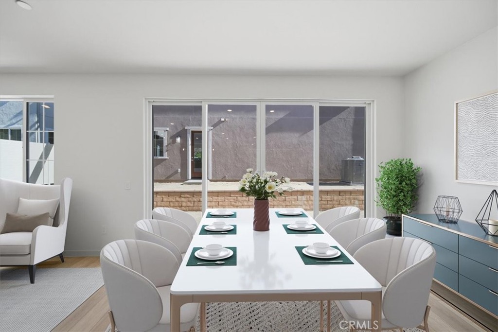4852 Arroyo Run Moorpark, CA 93021 - Photo 9 of 39 a view of a dining room with furniture and window