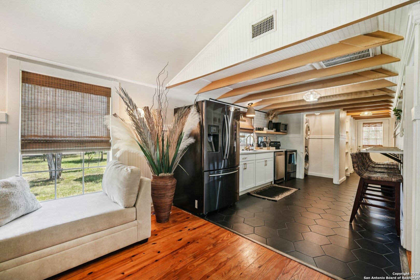 1038 Plateau Ridge New Braunfels, TX 78132 - Photo 6 of 18 a living room with stainless steel appliances furniture and a large window
