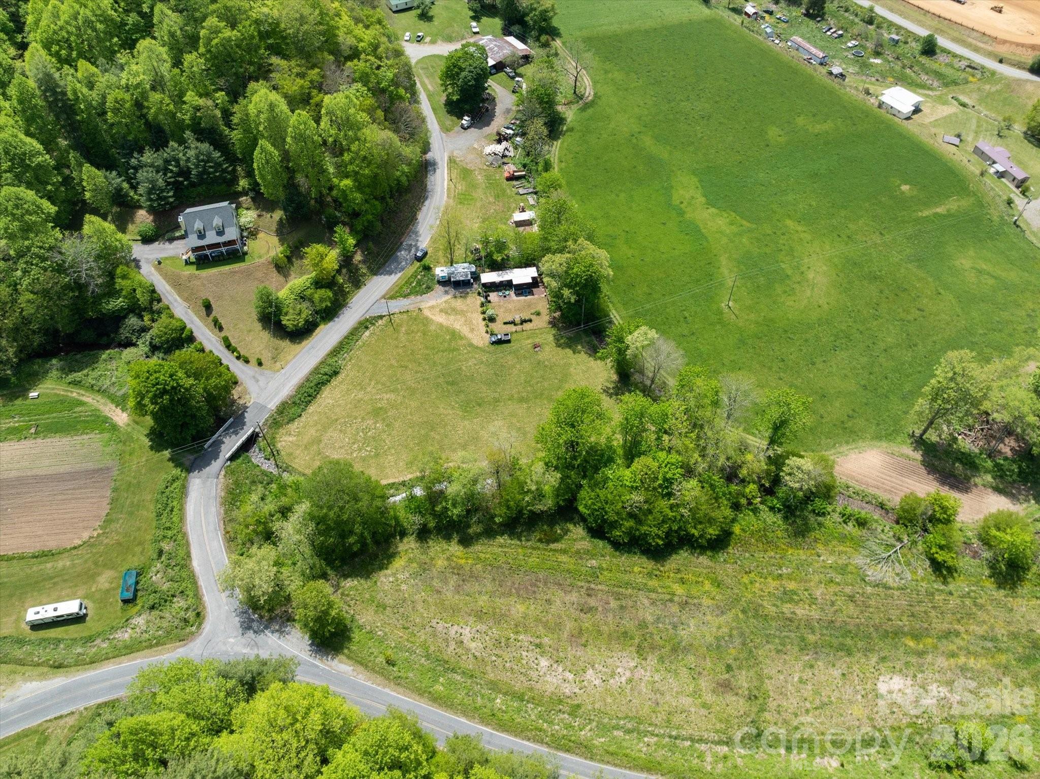 72 Amos Creek Road Marshall, NC 28753 - Photo 28 of 28 an aerial view of a residential houses with yard