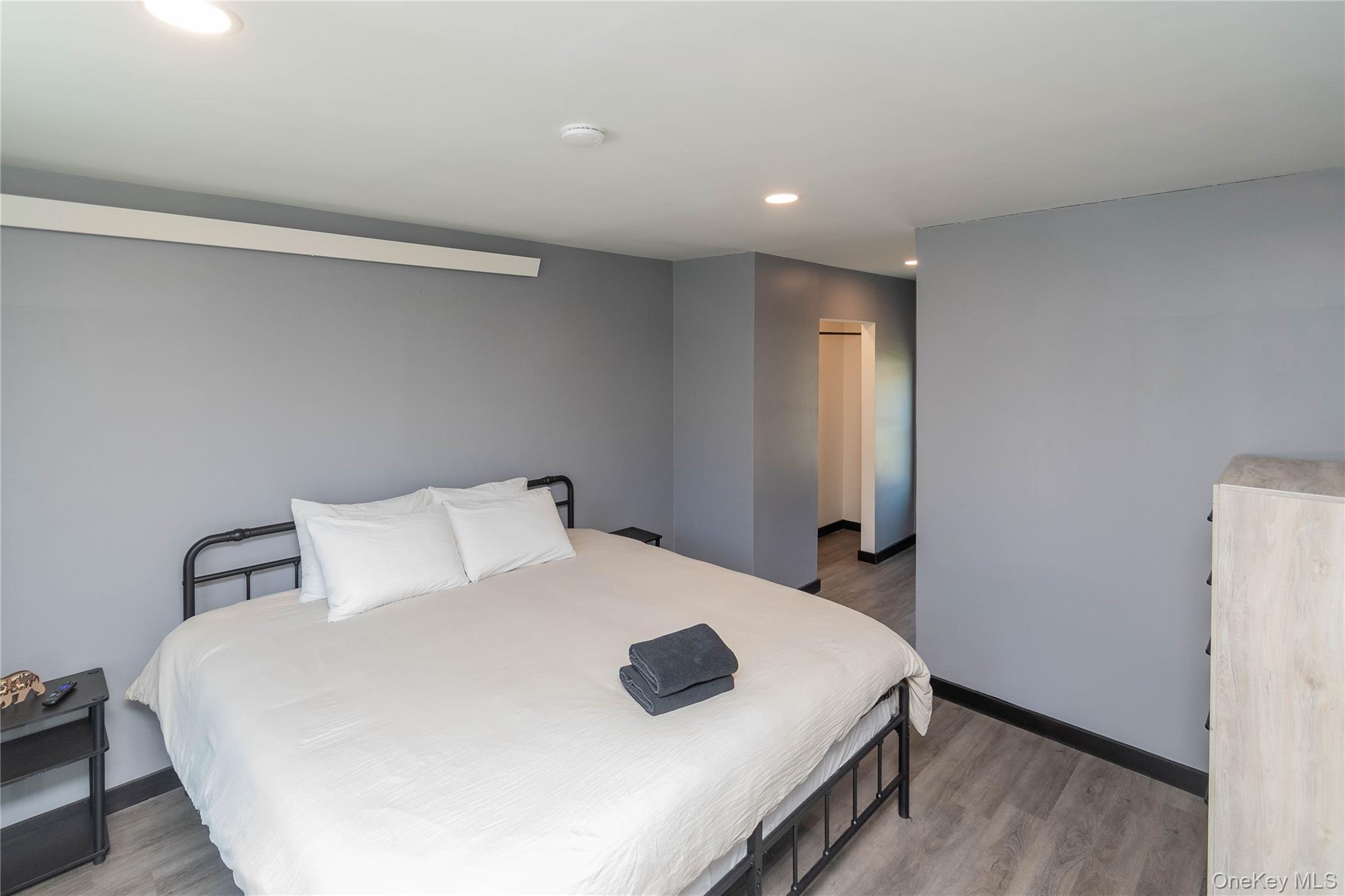 680 Old Rte 17 Livingston Manor, NY 12758 - Photo 18 of 29 a bedroom with a bed and a window