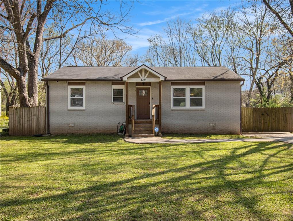 1225 Redford Drive Southeast Atlanta, GA 30315 - Photo 1 of 1 a house view with a outdoor space