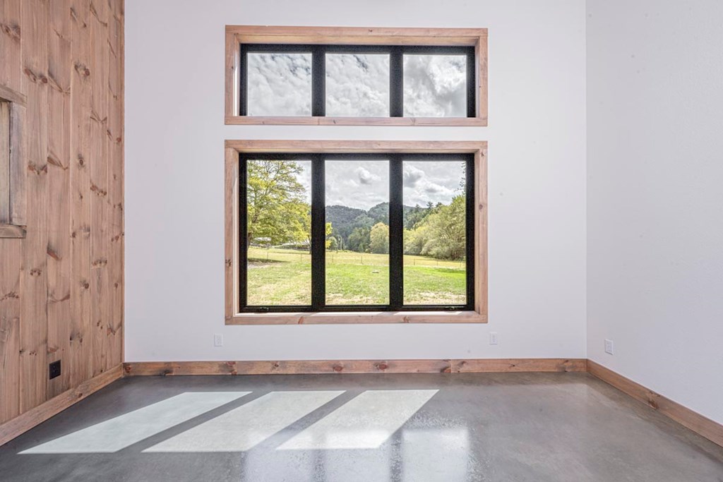 86 Valley Lake Road Mineral Bluff, GA 30559 - Photo 11 of 59 an empty room with a window