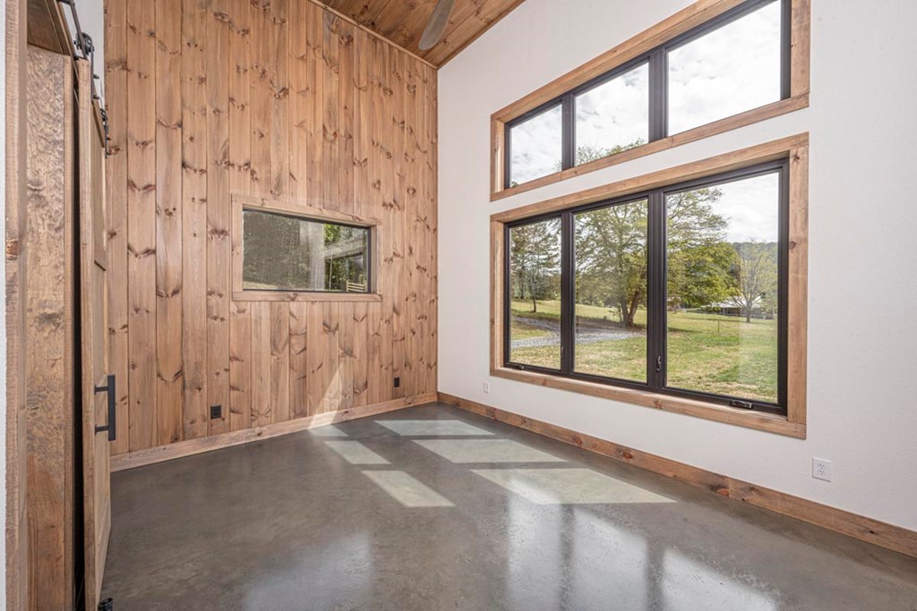 86 Valley Lake Road Mineral Bluff, GA 30559 - Photo 12 of 59 a view of an empty room with a window