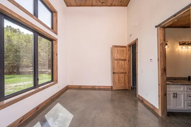 a view of a room with a large window