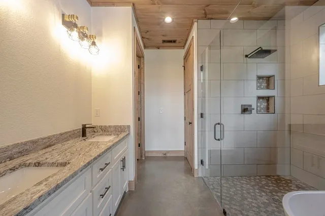 a white bath tub sitting in a bathroom