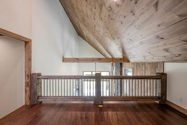 a view of a street with a yard