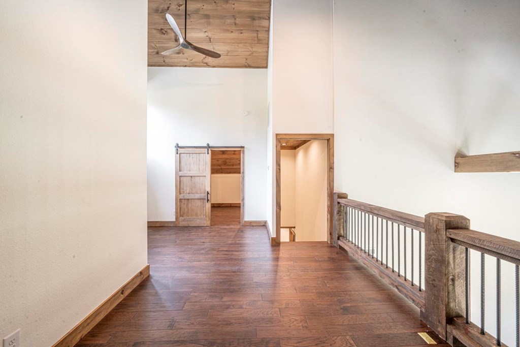 86 Valley Lake Road Mineral Bluff, GA 30559 - Photo 33 of 59 a view of a hallway with wooden floor