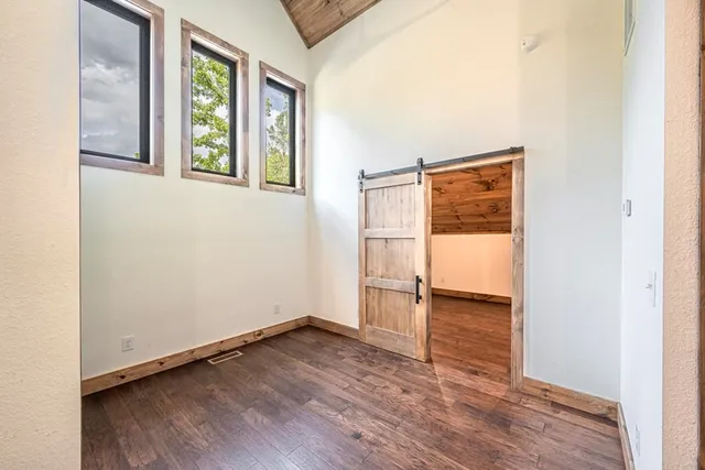 a view of a room with a large window