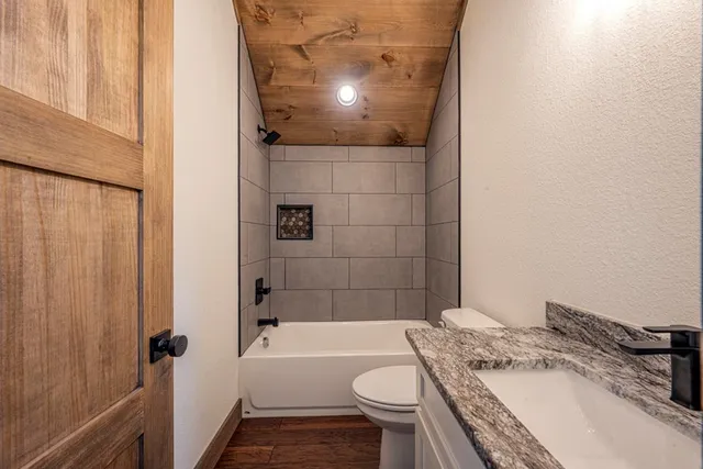 a view of a house with swimming pool and a yard