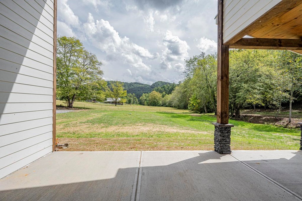 86 Valley Lake Road Mineral Bluff, GA 30559 - Photo 39 of 59 a view of a street with a yard