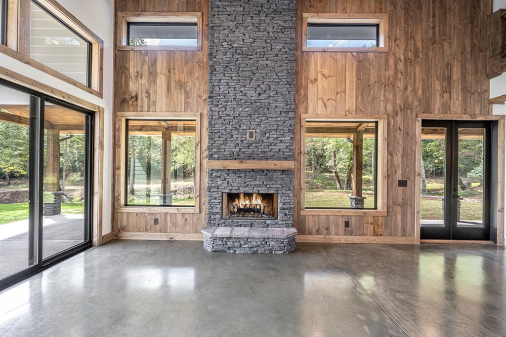 86 Valley Lake Road Mineral Bluff, GA 30559 - Photo 4 of 59 a living room with furniture and a fireplace