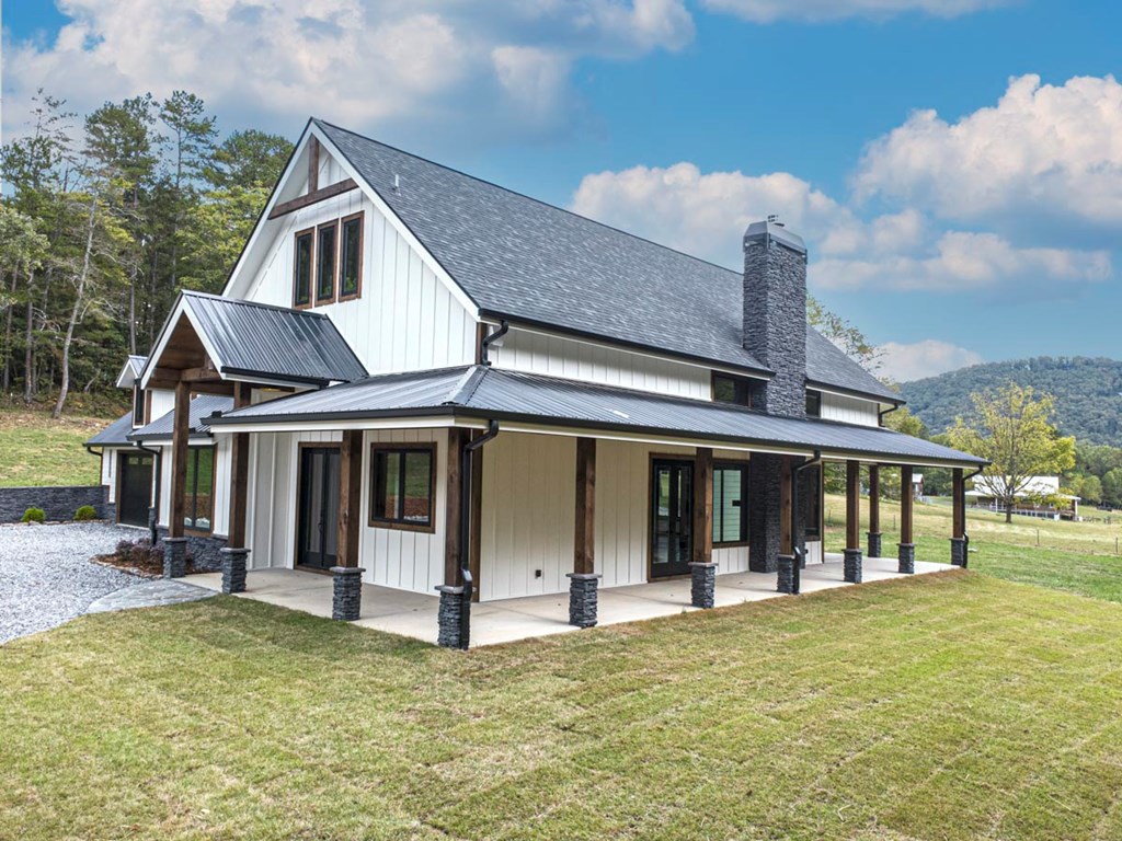 86 Valley Lake Road Mineral Bluff, GA 30559 - Photo 47 of 59 front view of a house with a yard
