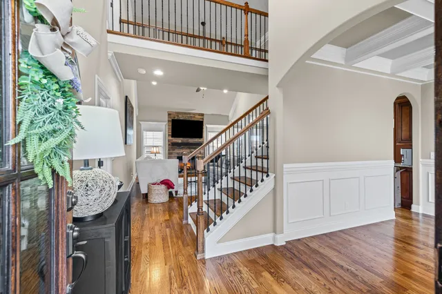 a view of entryway with wooden floor