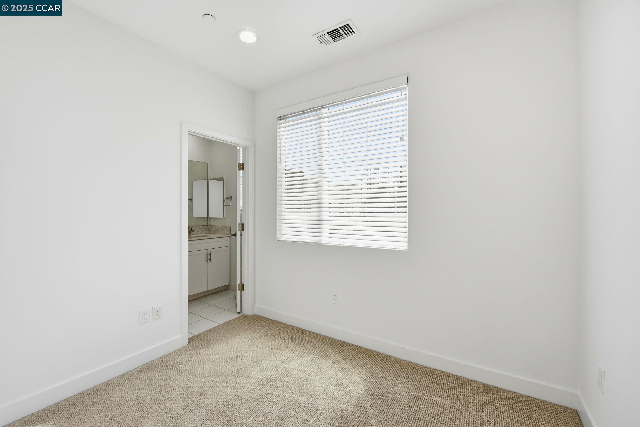 967 24th Street Oakland, CA 94607 - Photo 28 of 43 an empty room with windows
