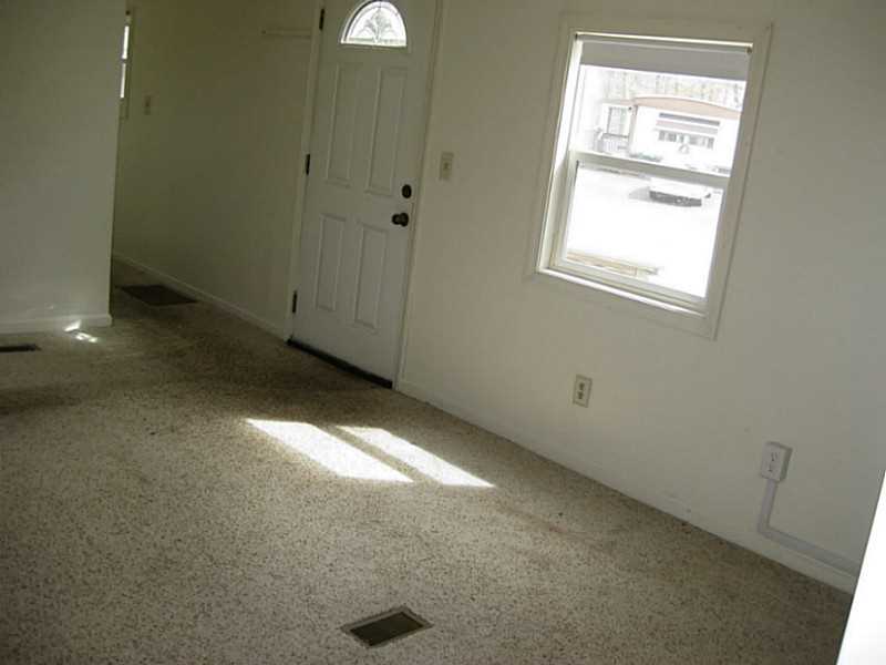 27 Lane B Coventry, RI 02816 - Photo 7 of 12 Living Room.