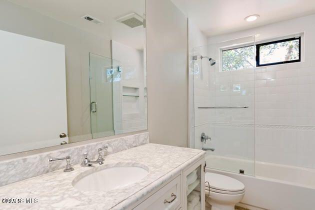 2121 Vina Del Mar Oxnard, CA 93035 - Photo 12 of 17 a bathroom with a granite countertop sink toilet and shower